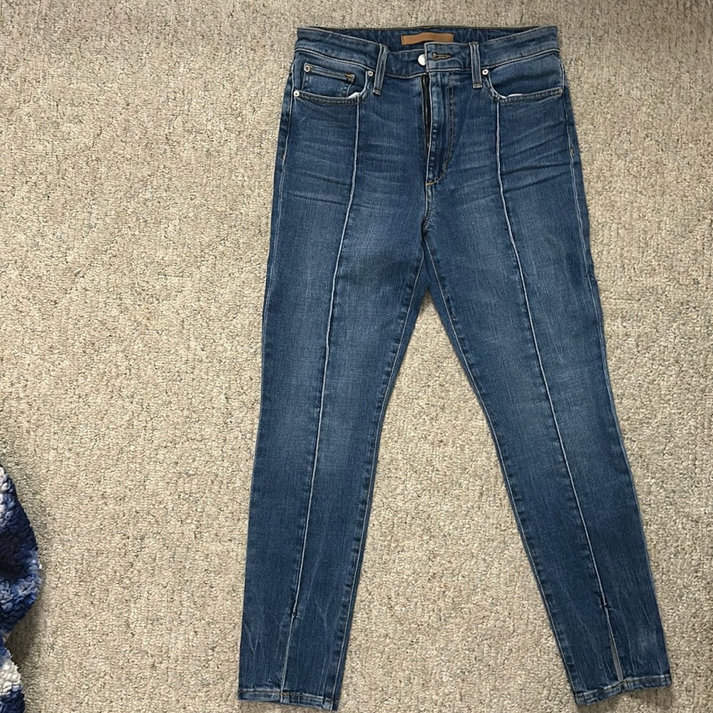 Joes jeans with front piping and slit at ankle.